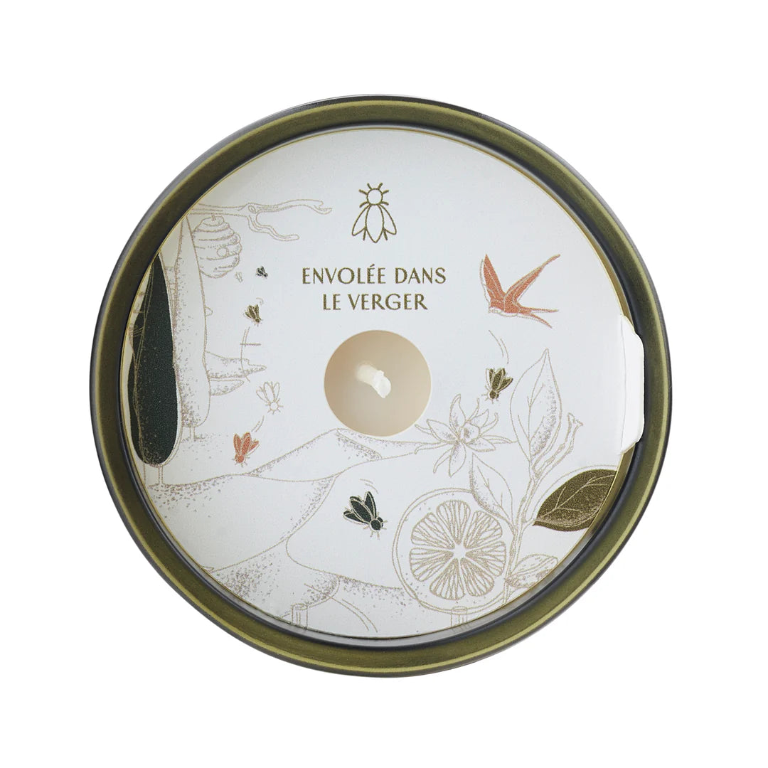 Round tin with nature-themed design and text on a white background