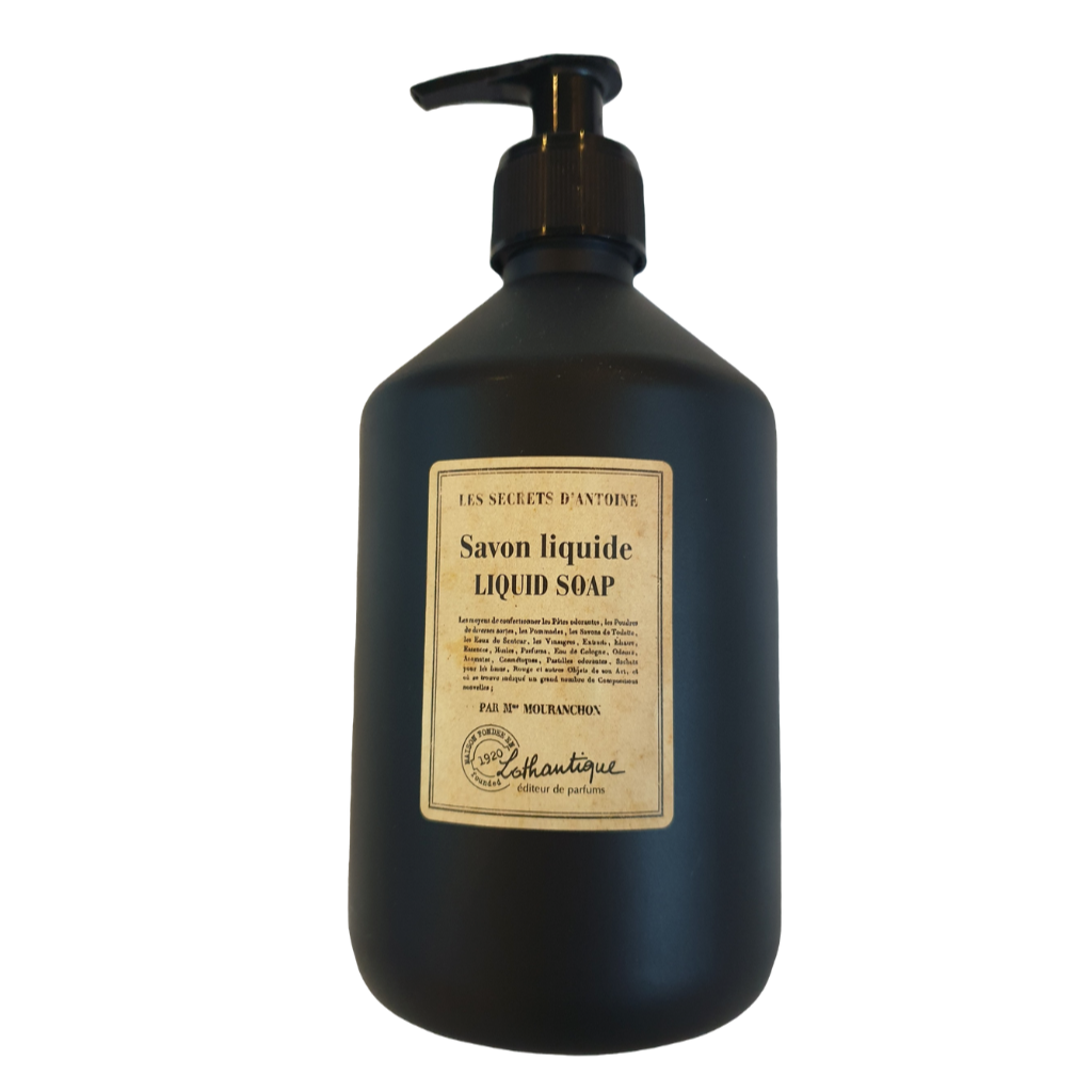 Black liquid soap bottle with pump and label on a white background