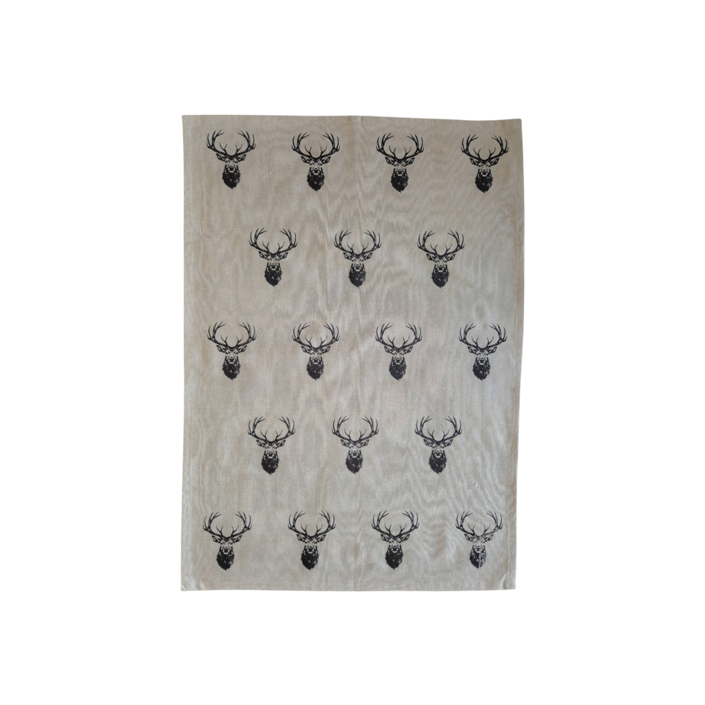 Beige towel with black deer head pattern on a white background