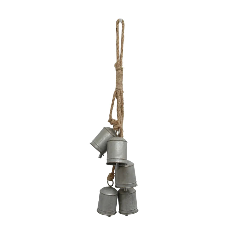 Set of 5 metal bells hanging from a rope on a white background