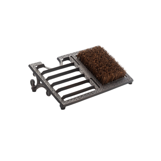 Cast iron boot scraping rack with a brown brush