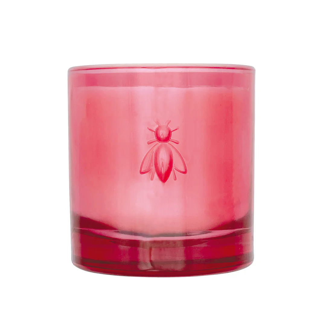Pink glass candle with a logo on a white background