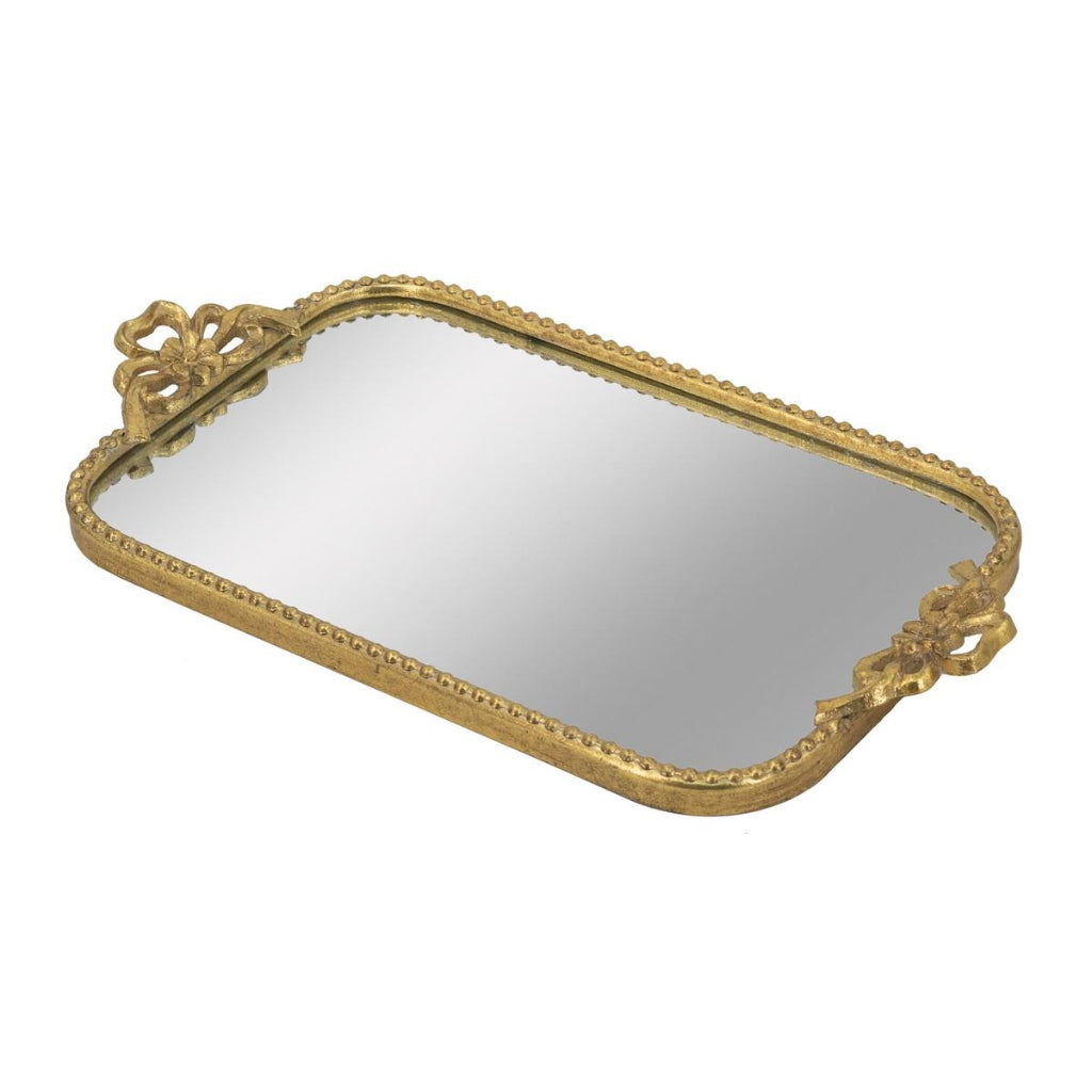 Decorative gold-trimmed mirror on a white background