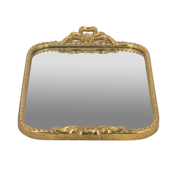 Decorative gold-framed mirror on a white background