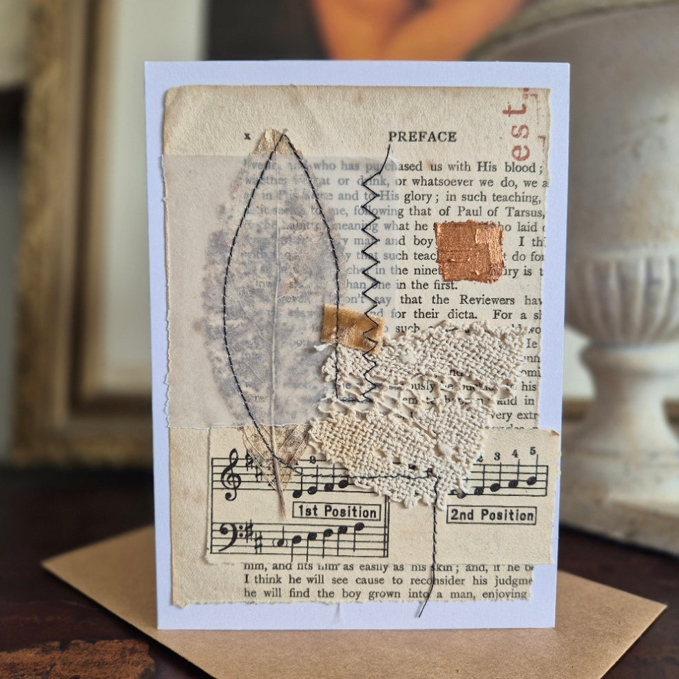 Mixed Media card with vintage text and music notes on a textured card