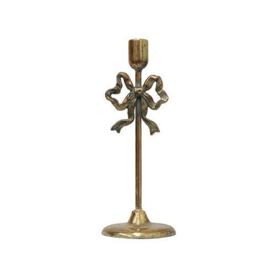 Bow candle holder with bow design on a white background 