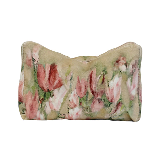 Floral-patterned pillow on a white background