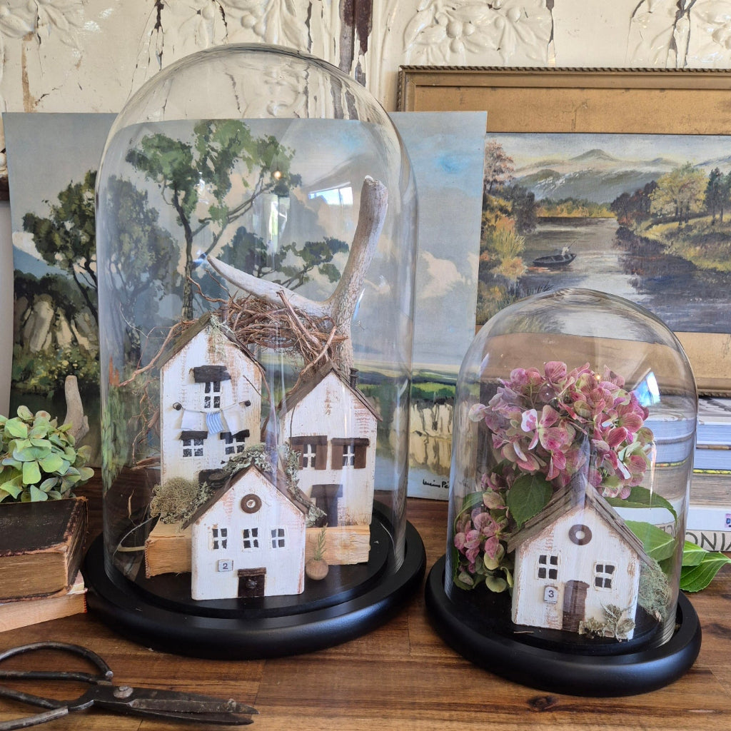 Mini Houses in glass domes