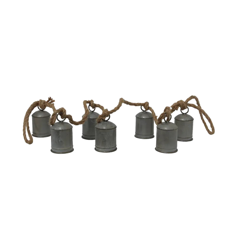 String of metal lanterns with rope on a white background
