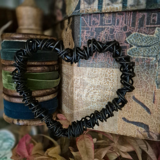 Twisted wire heart for wall hanging