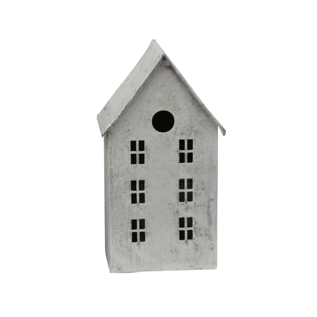 Decorative house-shaped tealight with a white roof on a white background